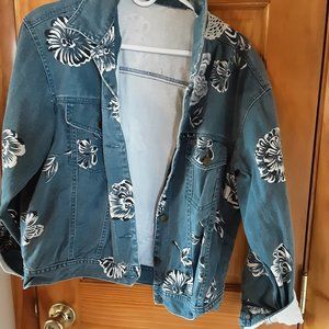 Denim jacket with lace decoration